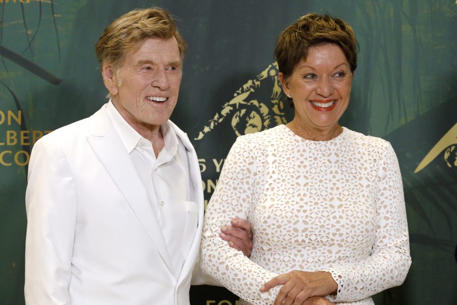 epa09552852 US actor Robert Redford (L) and his wife, German painter Sibylle Szaggars (R), arrive at the Prince Albert II Foundation Ceremony Awards 2021 in Monaco, 29 October 2021. The foundation is a charity donating in environmental projects.  EPA/SEBASTIEN NOGIER