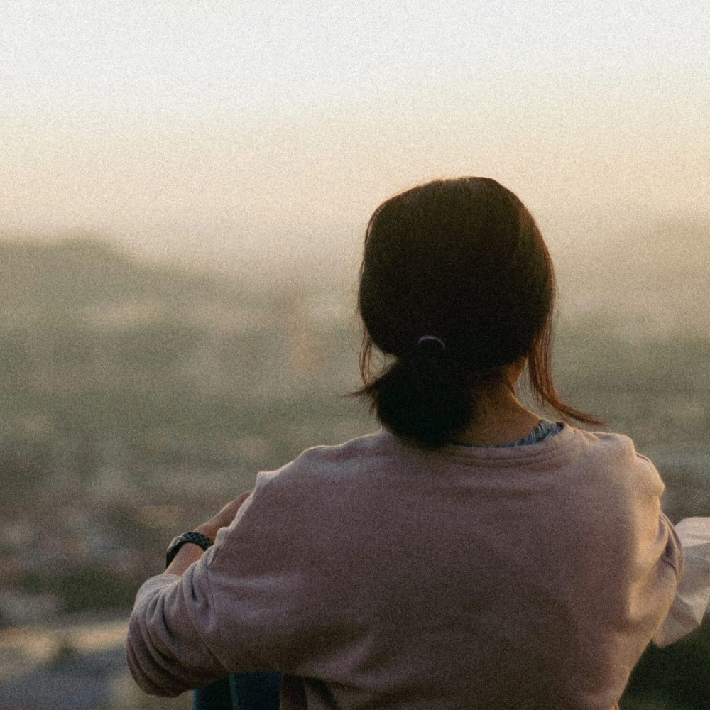 benson-low-woman-alone-unsplash