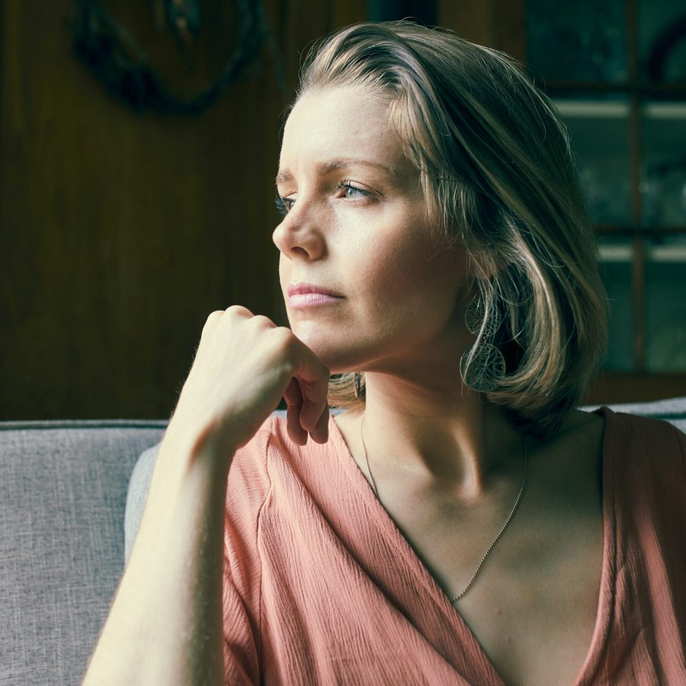darius-bashar-woman-thinking-unsplash