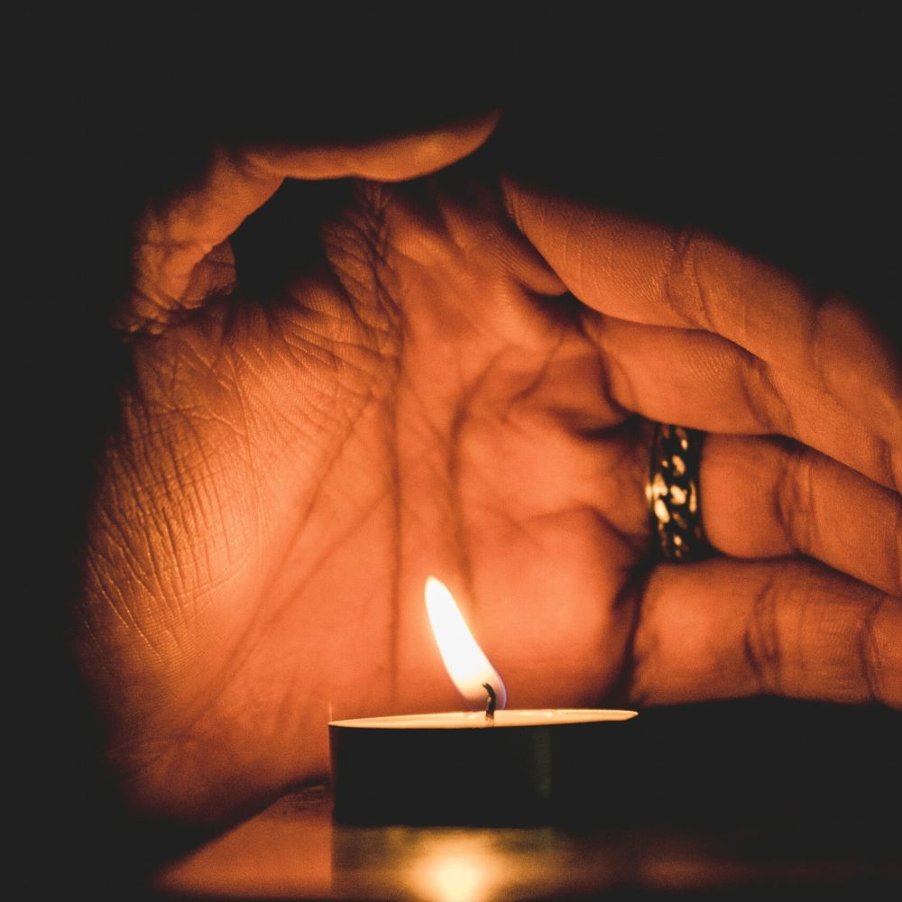 hand-candle-unsplash